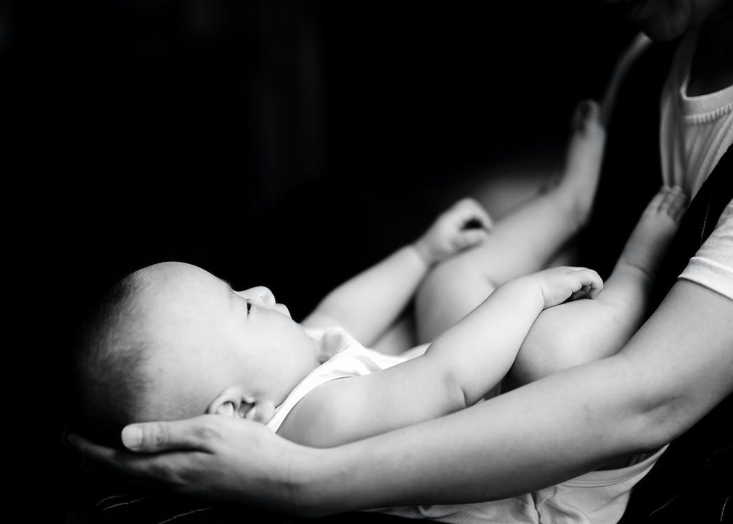 image 4 Elderly Family Planning a New Baby Photoshoot